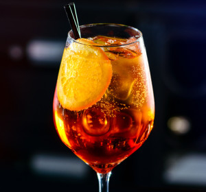 Classic Italian Aperol Spritz Cocktail Close-up On A Bar In Nigh